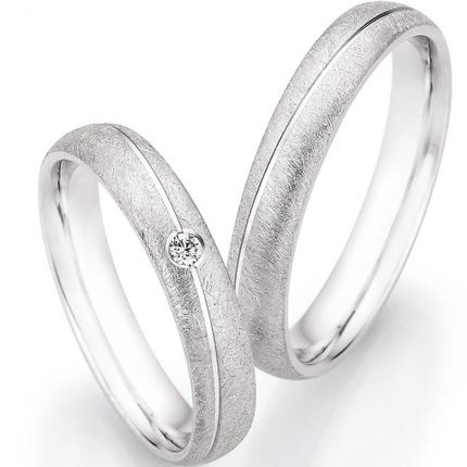 Ringpaar aus Silber mit eismatter Obferfläche und wahlweise Brillant